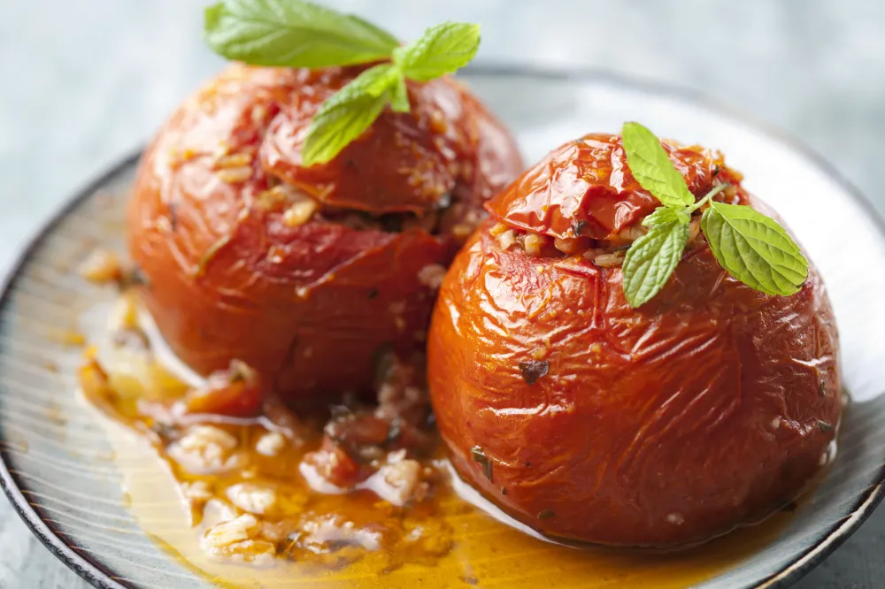 Tomates farcies au jambon et aux herbes